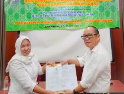 Pj Bupati Harmin Ramba Tandatangani NPHD Penyaluran Beasiswa Bagi Mahasiswa Asal Konawe di Jakarta